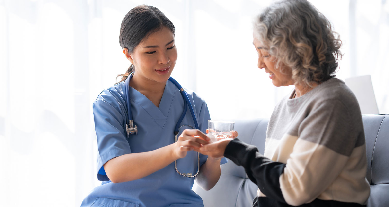 Asian female doctor explaining treatment and taking medicine.